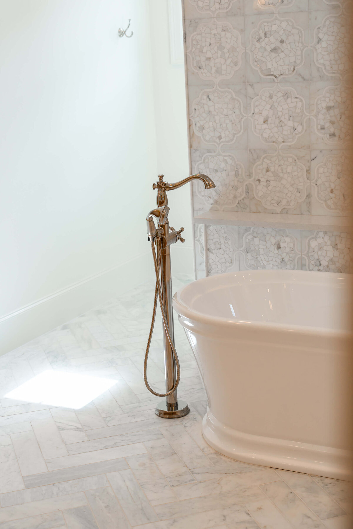 Primary bathroom details with freestanding tub