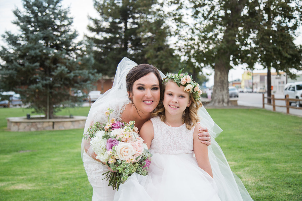 Bride and flower girl at 1880 Union Hotel Wedding
