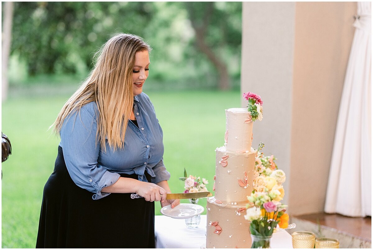 Wedding Coordinator cutting cake