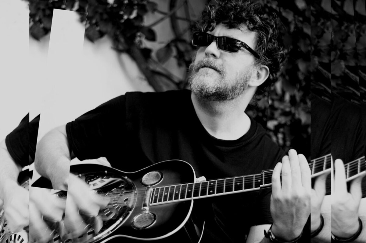 Ben Shepard Musician Portrait black and white playing guitar