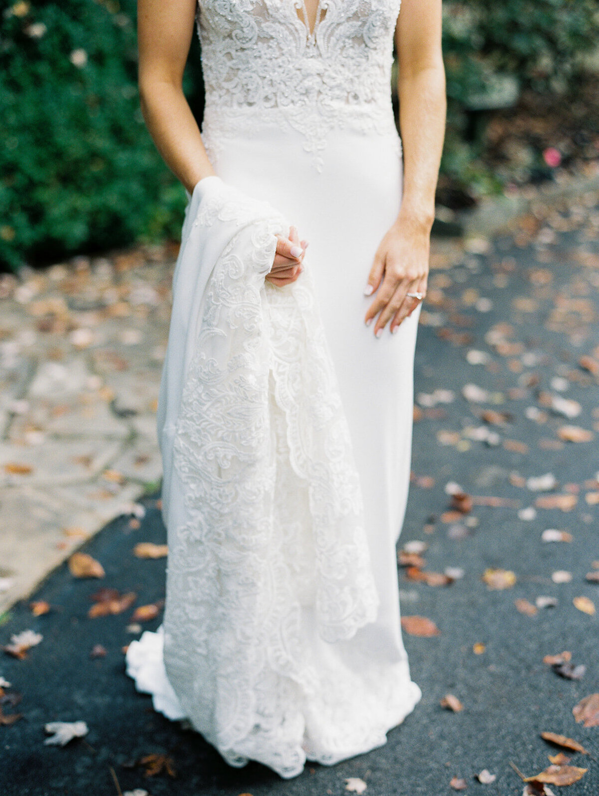 bride-holding-dress