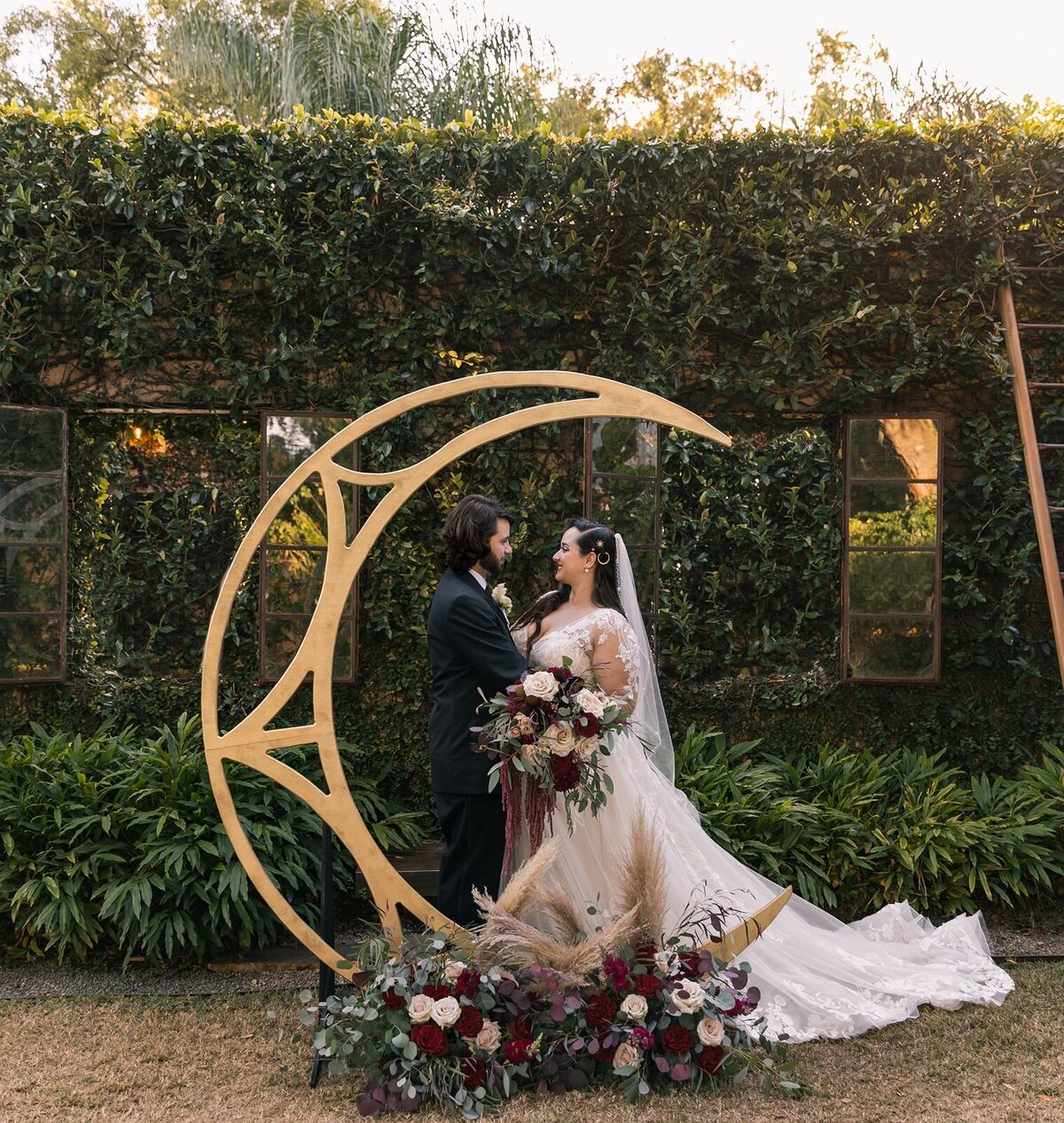 Bride and groom with moon arch The Acre Orlando Florida