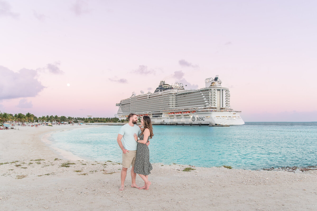 bahamas cruise couple at sunset in front of ship