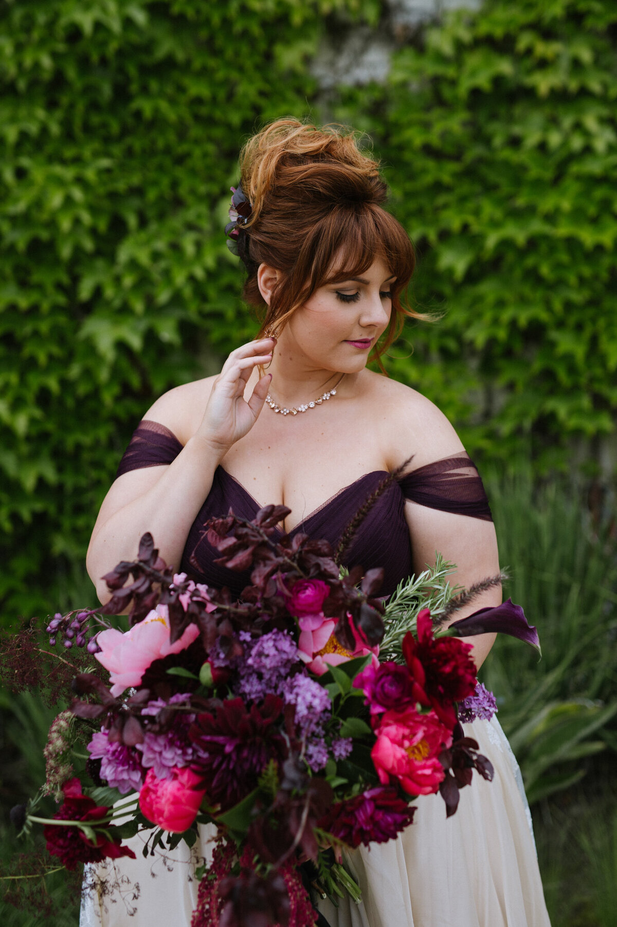 Stunning orange haired bride with maroon, purple and pink bouquet, captured by Christy D. Swanberg Photography, editorial elopement and wedding photographer in Calgary, Alberta, featured on the Bronte Bride Vendor Guide.