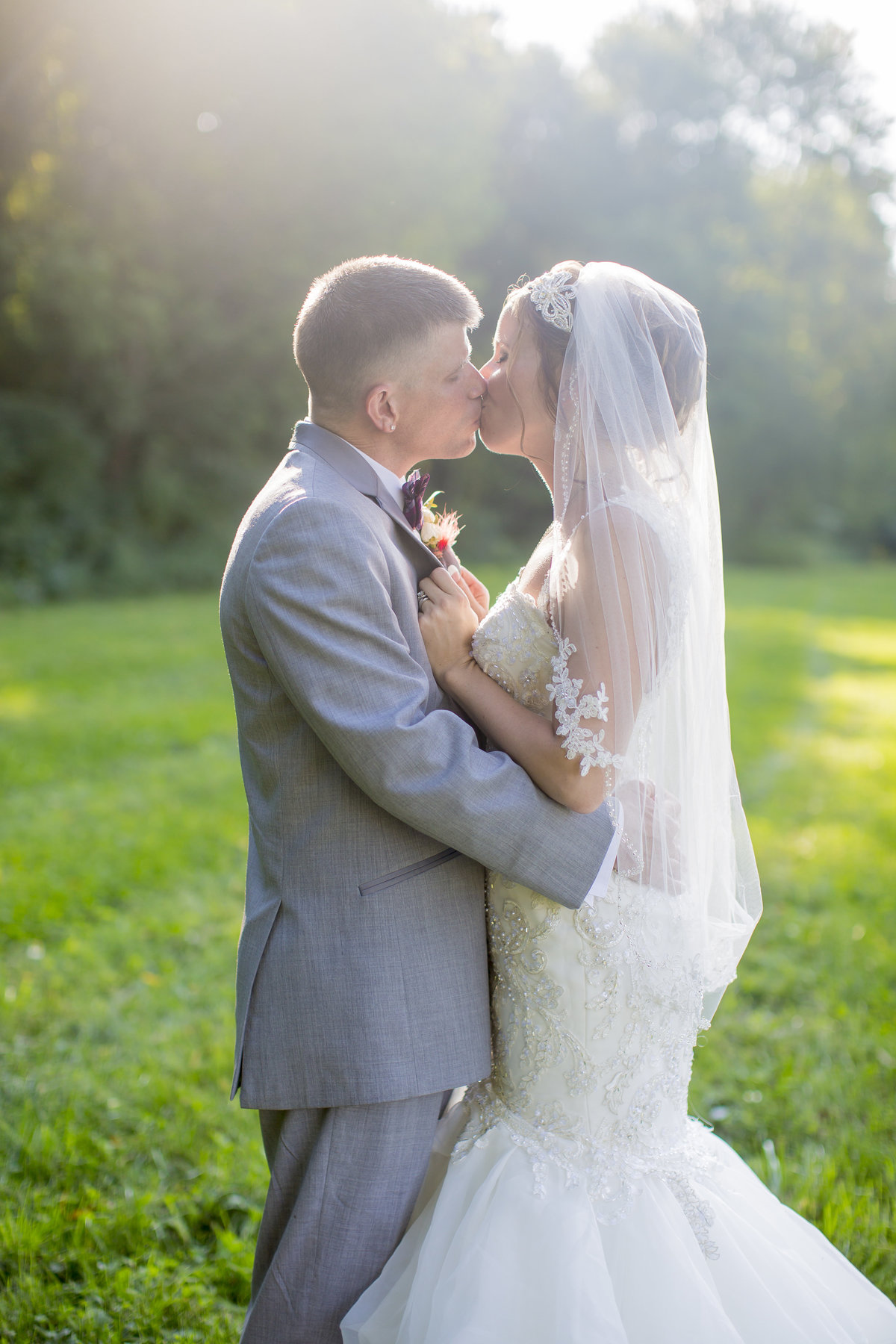 Bud and Kristen have a wedding at the Grove City College Chapel and have their reception at a Barn on Lake Latonka.