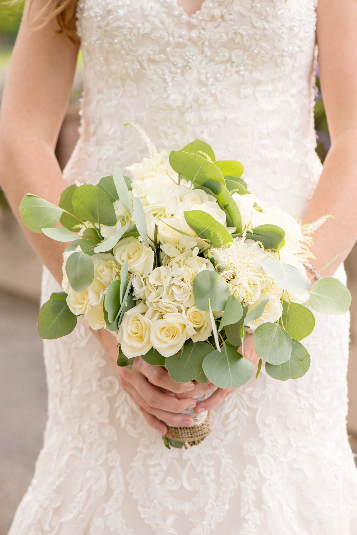 bride holding her bouquet at Willow Creek Golf and Country Club wedding