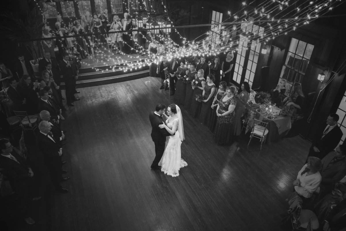 bride and groom first dance at the water witch club