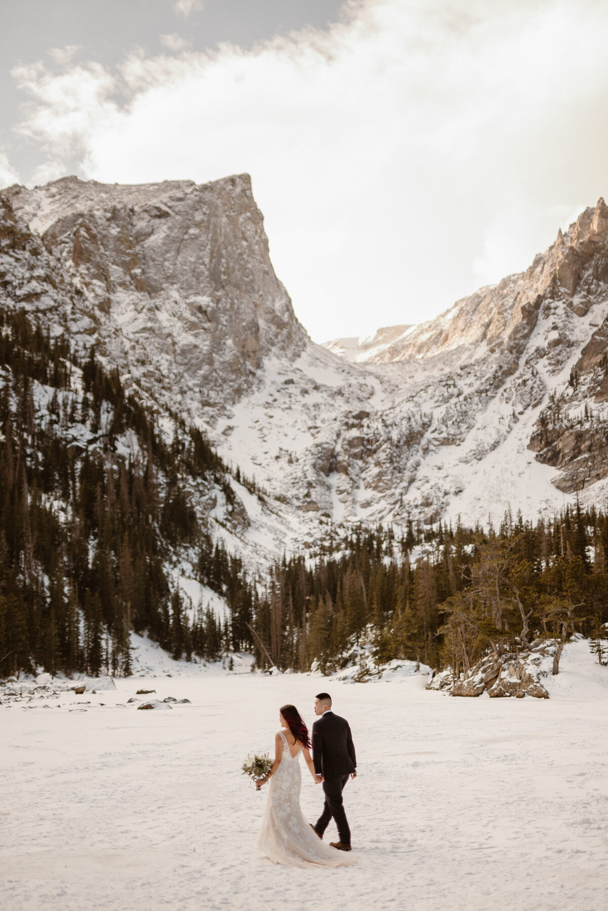 Couple hikes to Dream Lake on their wedding day in Rocky Mountain National Park