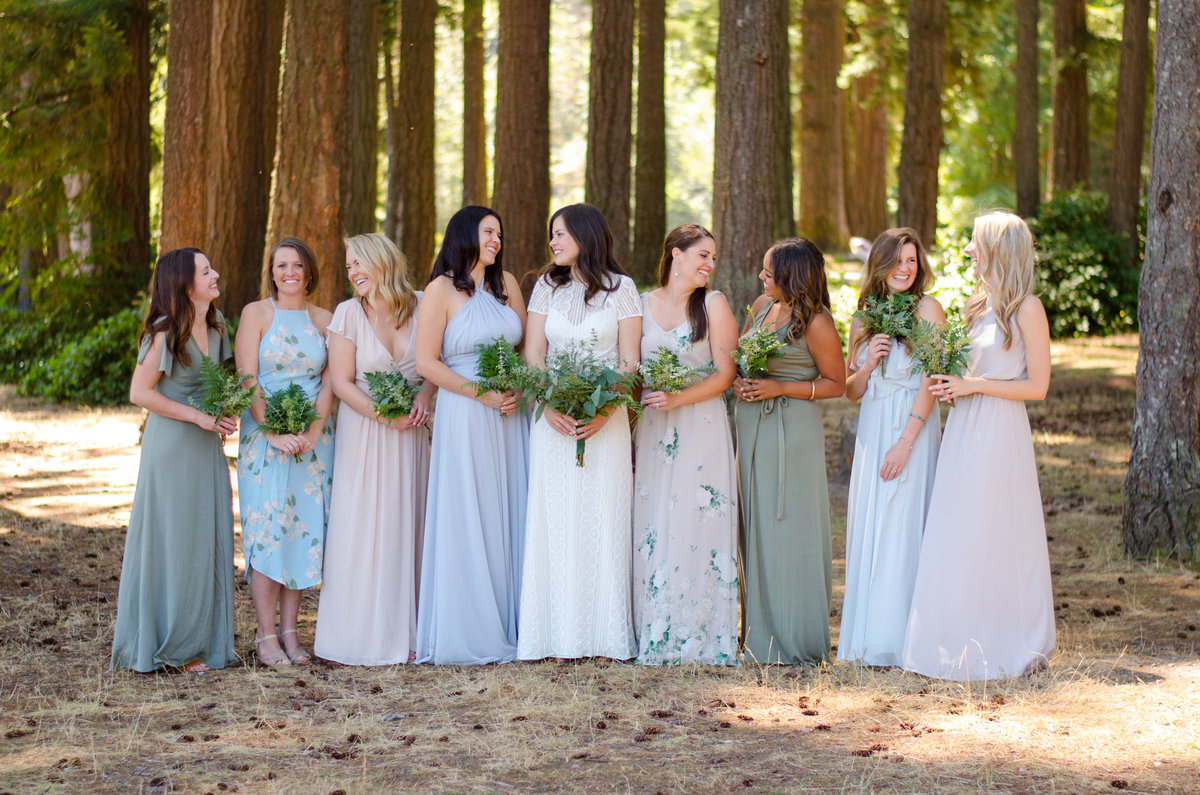 Bride with bridal party in woods