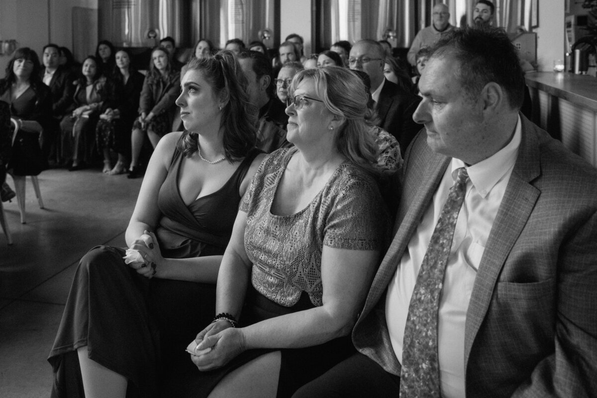 family of the bride watching ceremony