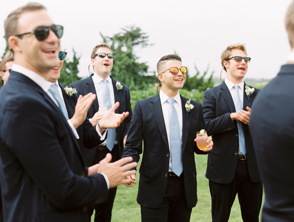 photos of groomsmen for wedding at newport castle hill
