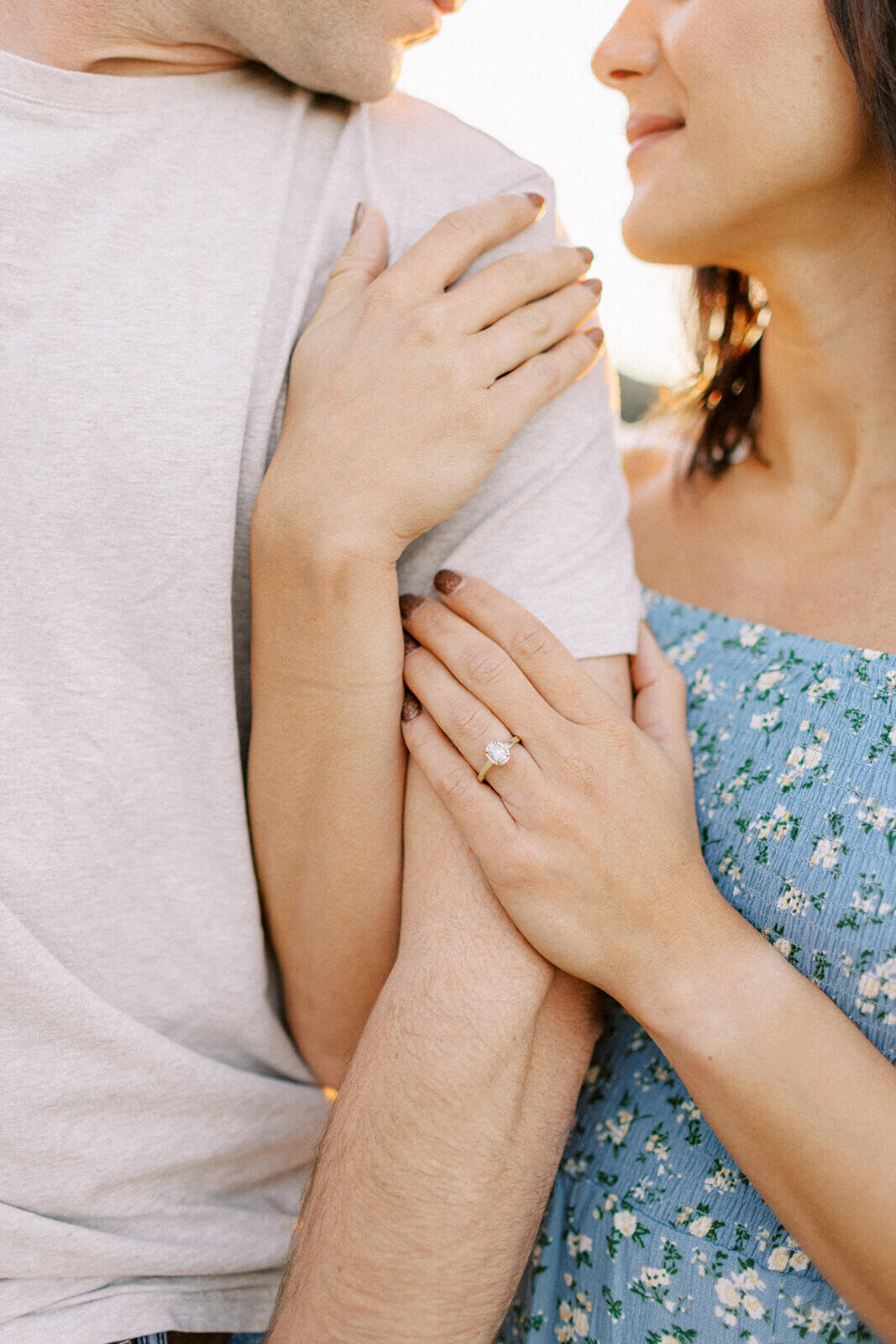 engagement-couple-link-arms