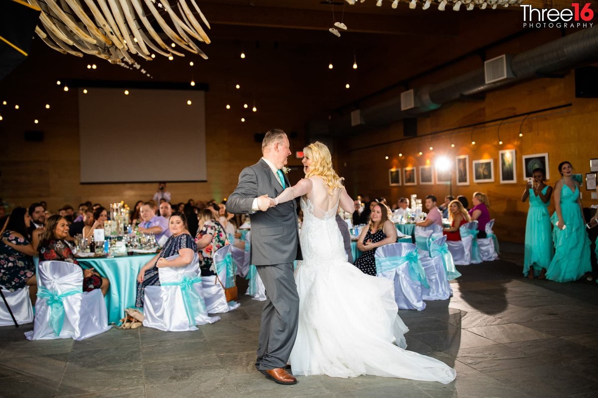Bride dances with her father at her wedding reception