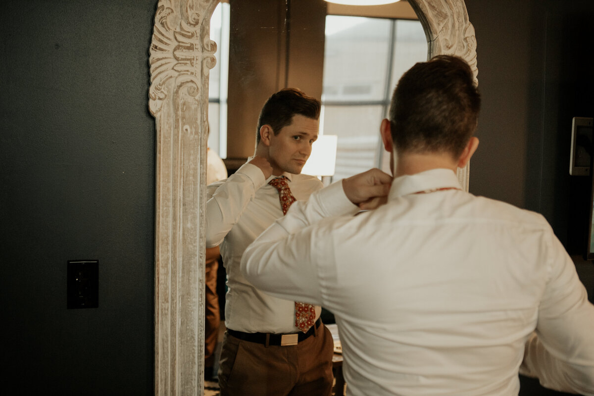 groom-getting-ready-portrait-brownstone-calgary