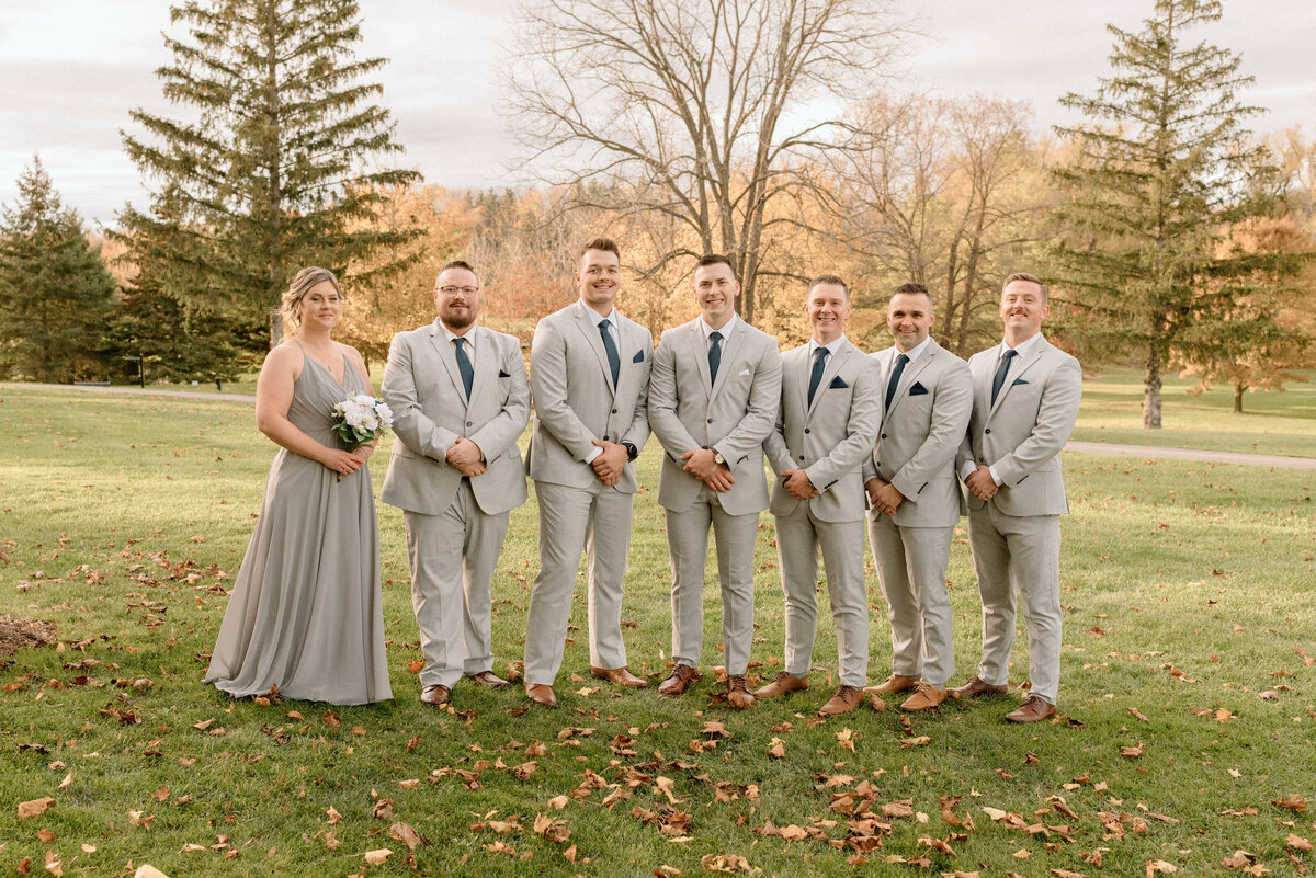 the groom with his groomsmen and groomsmaid