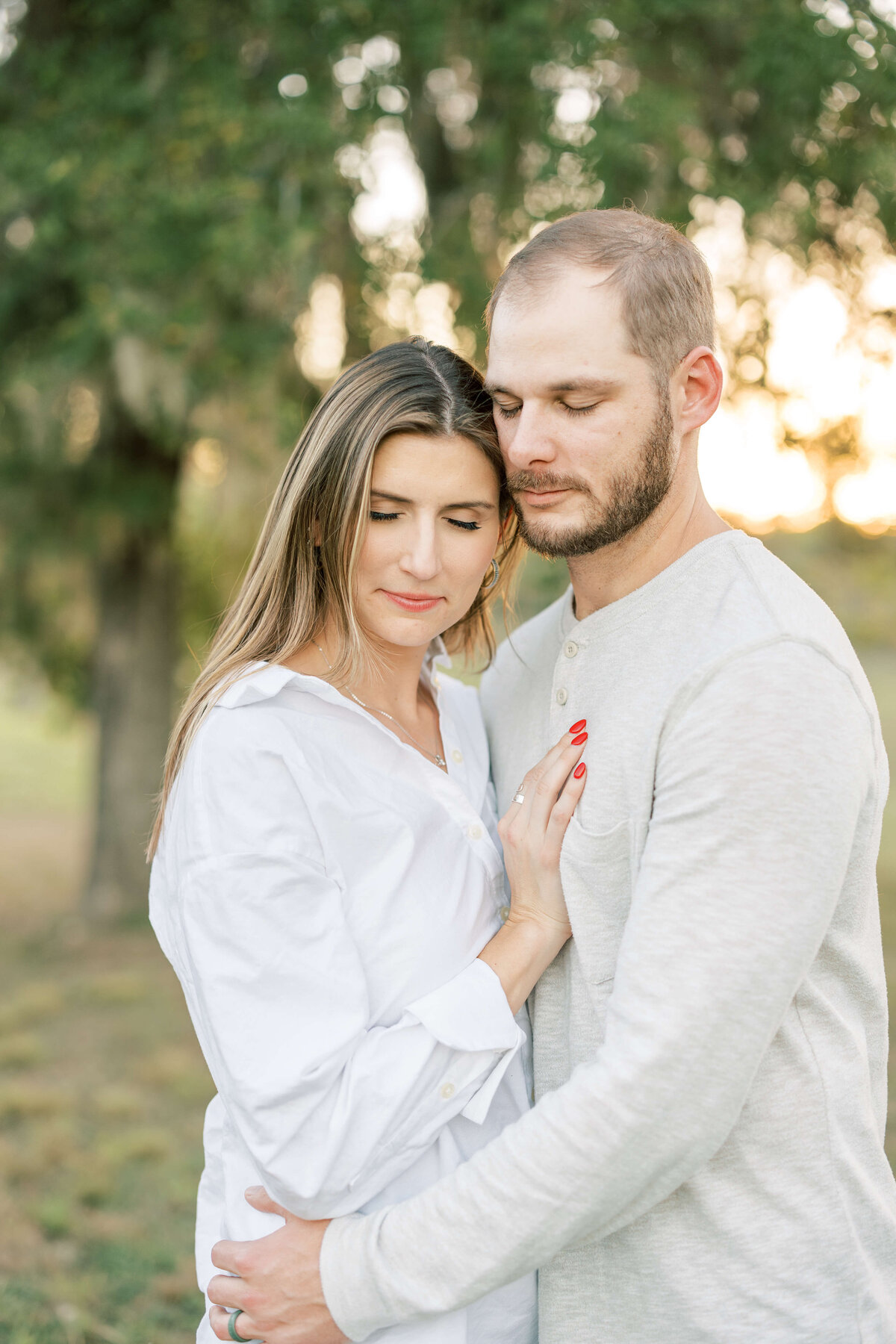 a husband and wife embracing