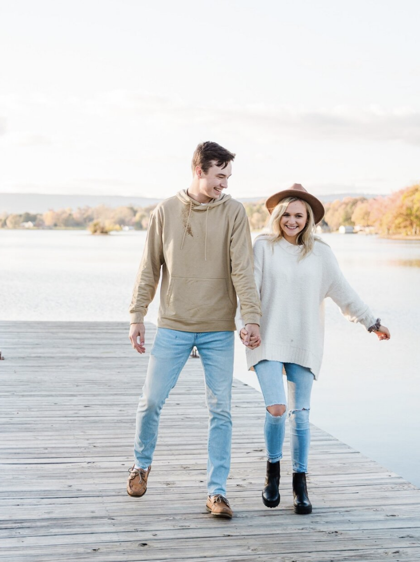 couple walking on a dock at the lake in Chattanooga