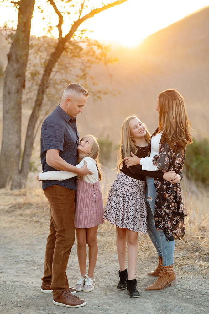 Family session outside during a sunset