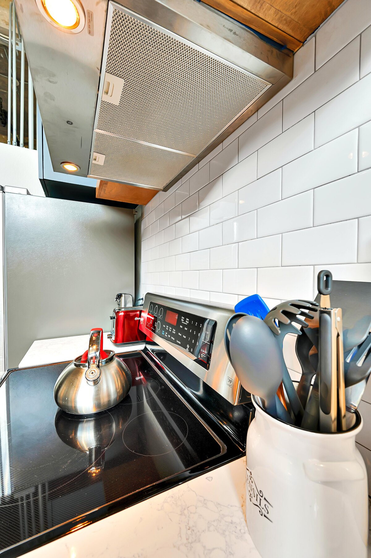 Stovetop in the kitchen of this two-bedroom, two-bathroom vacation rental condo in the historic Behrens building in the heart of the Magnolia Silo District in downtown Waco, TX.