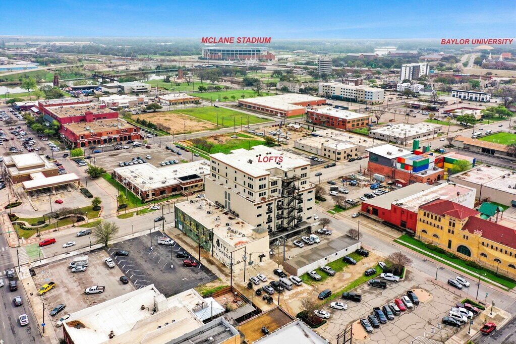 Aerial view of downtown Waco and location of Behrens lofts which holds this 2 bedroom, 2.5 bathroom luxury vacation rental loft condo for 8 guests with incredible downtown views, free parking, free wifi and professional decor in downtown Waco, TX.