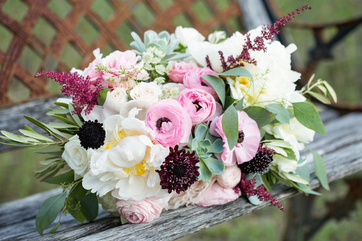 camp lucy wedding photographer bride bouquet 3509 Creek Rd, Dripping Springs, TX 78620