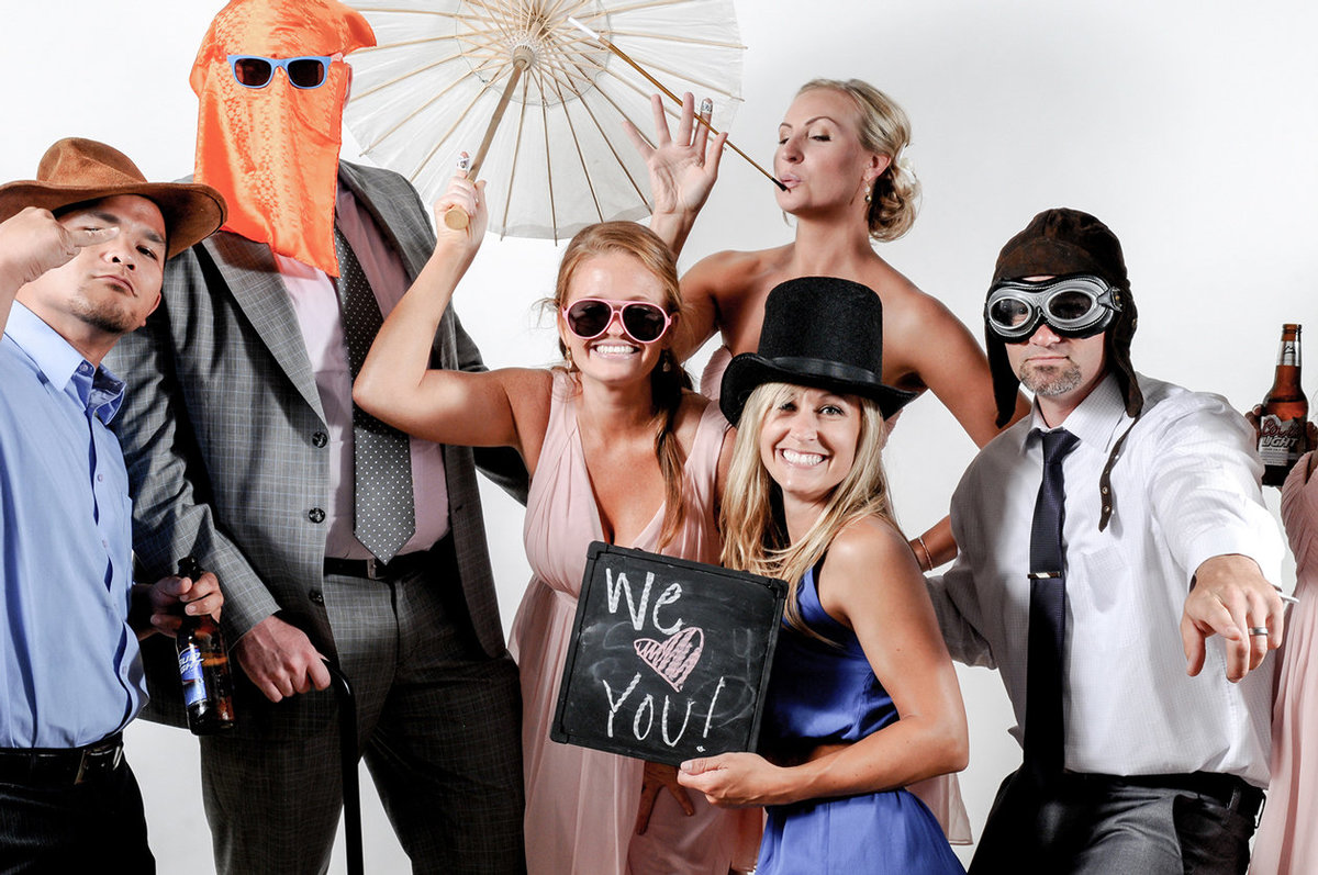 0015-Photo-Booth-Rental-at-Wedding-Reception-Guests-Having-Fun
