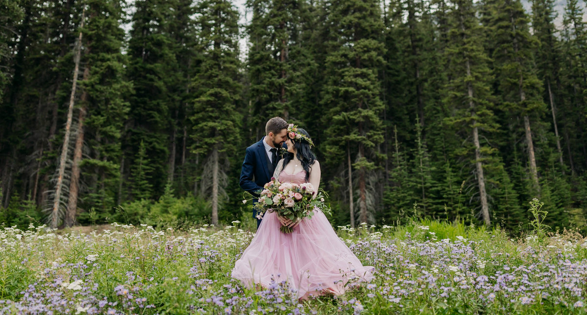 moraine-lake-pink-wedding-dress-wildflowers-elopement-wedding