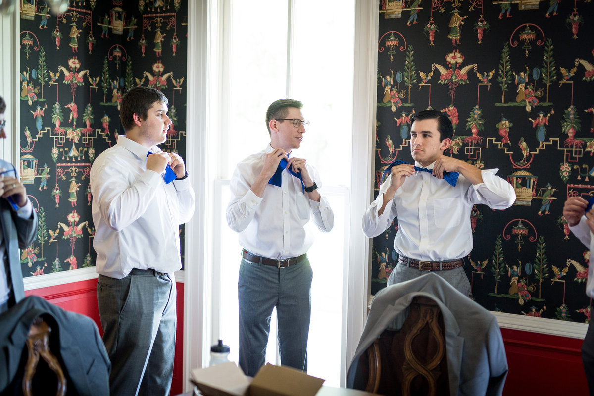 groom and groomsmen getting ready before wedding ceremony in San Antonio Texas Grace Point Church venue