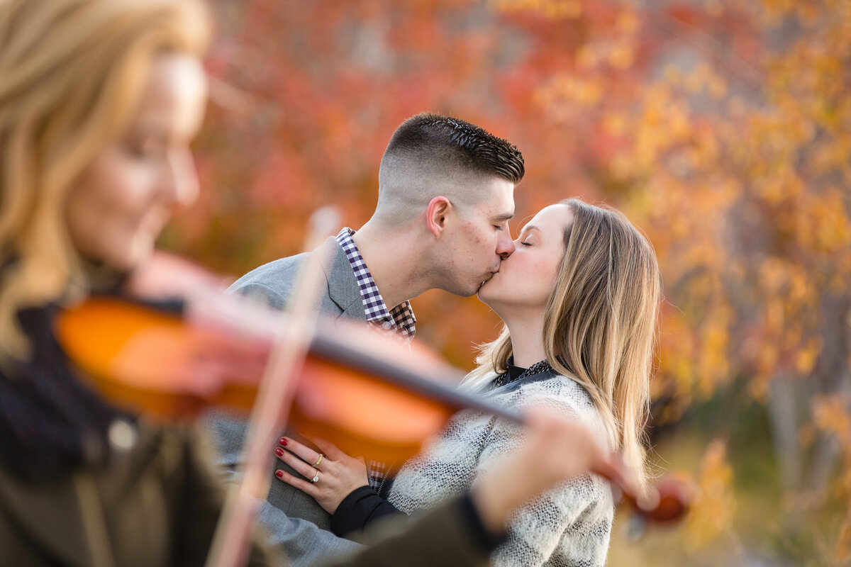couple kissing in a park