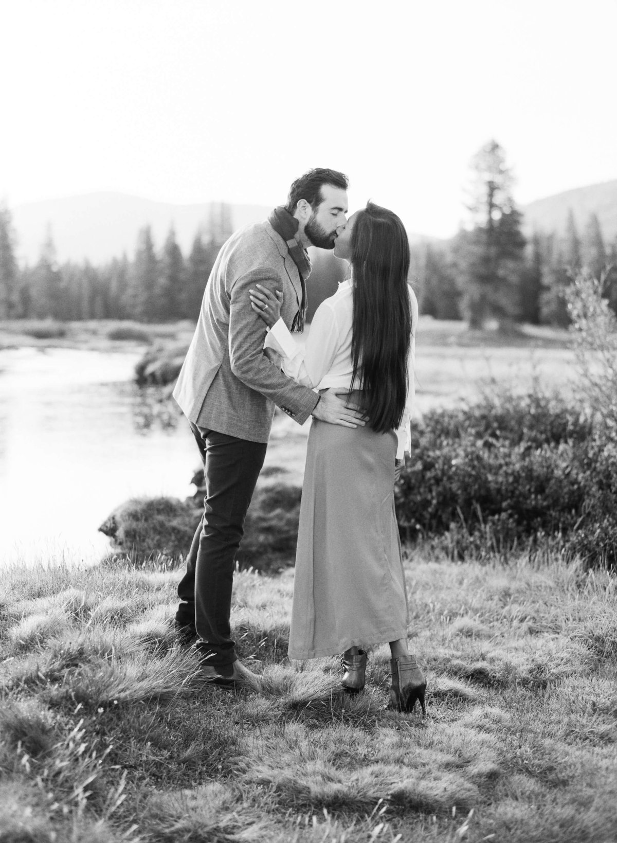 19-KTMerry-destination-engagement-couple-kissing-Yosemite