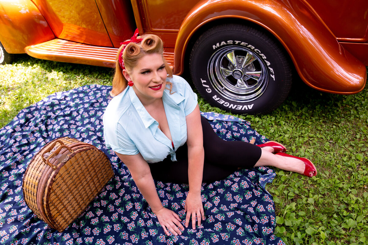 goddess studio boudoir woman pinup style picnic basket old ford truck pinup hair red lipstick red bra rosie