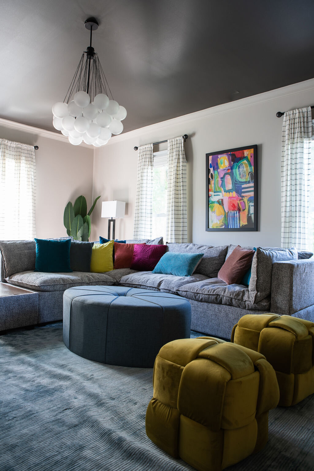 colorful furniture and artwork in a media room