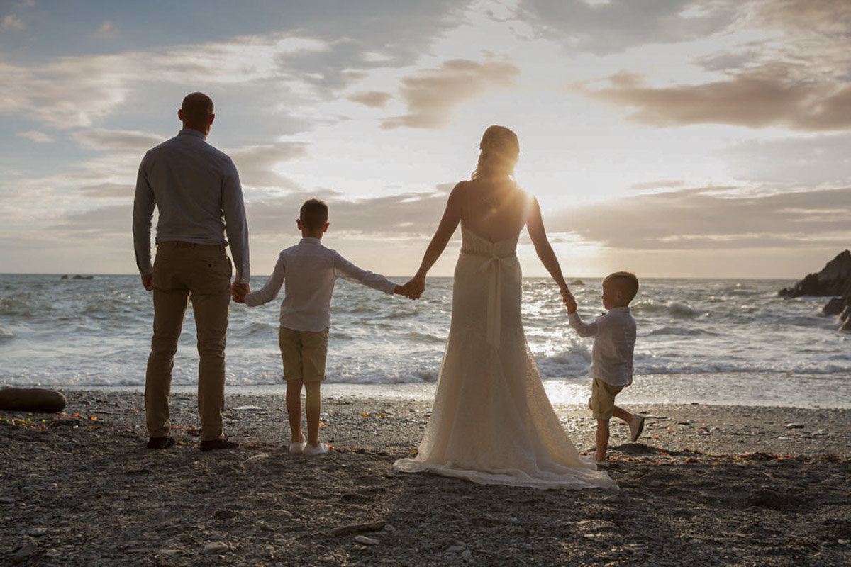 Family wedding photo at Tunnels Beaches