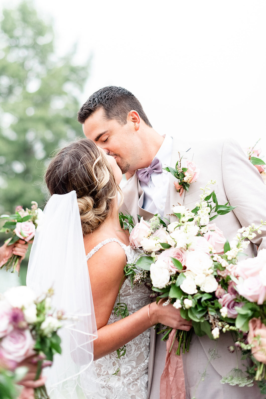 Bride and groom kissing, Light and airy wedding photography by the Best Boise Wedding Photographers