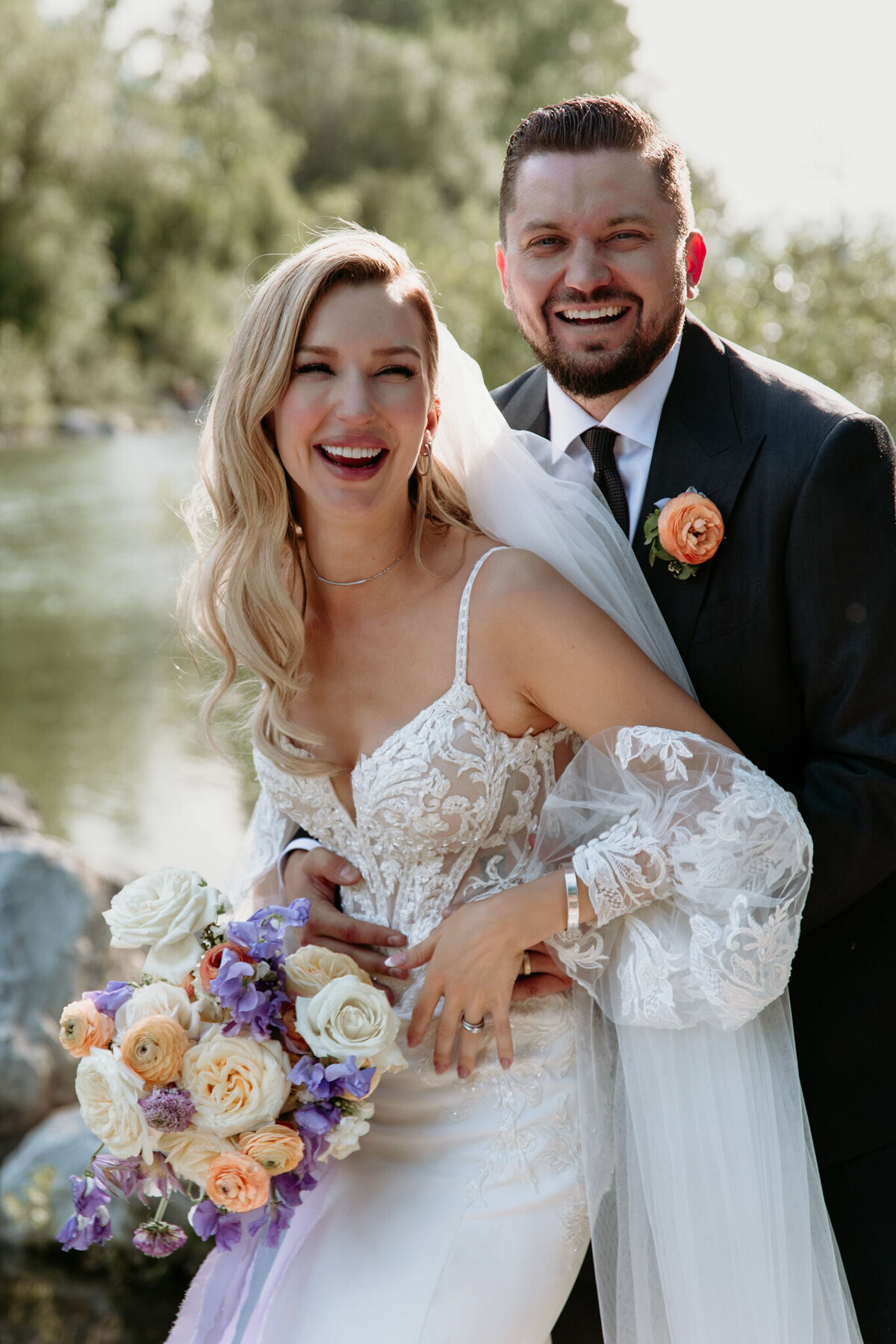 Purple and peach, spring-inspired ceremony florals by The Romantiks, romantic wedding florals based in Calgary, AB & Cranbrook, BC. Featured on the Brontë Bride Vendor Guide.