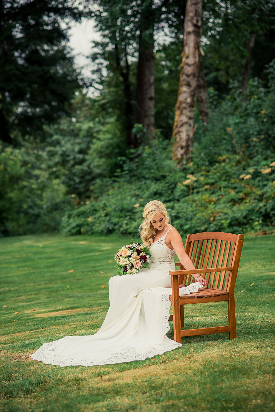 bride sitting on bench