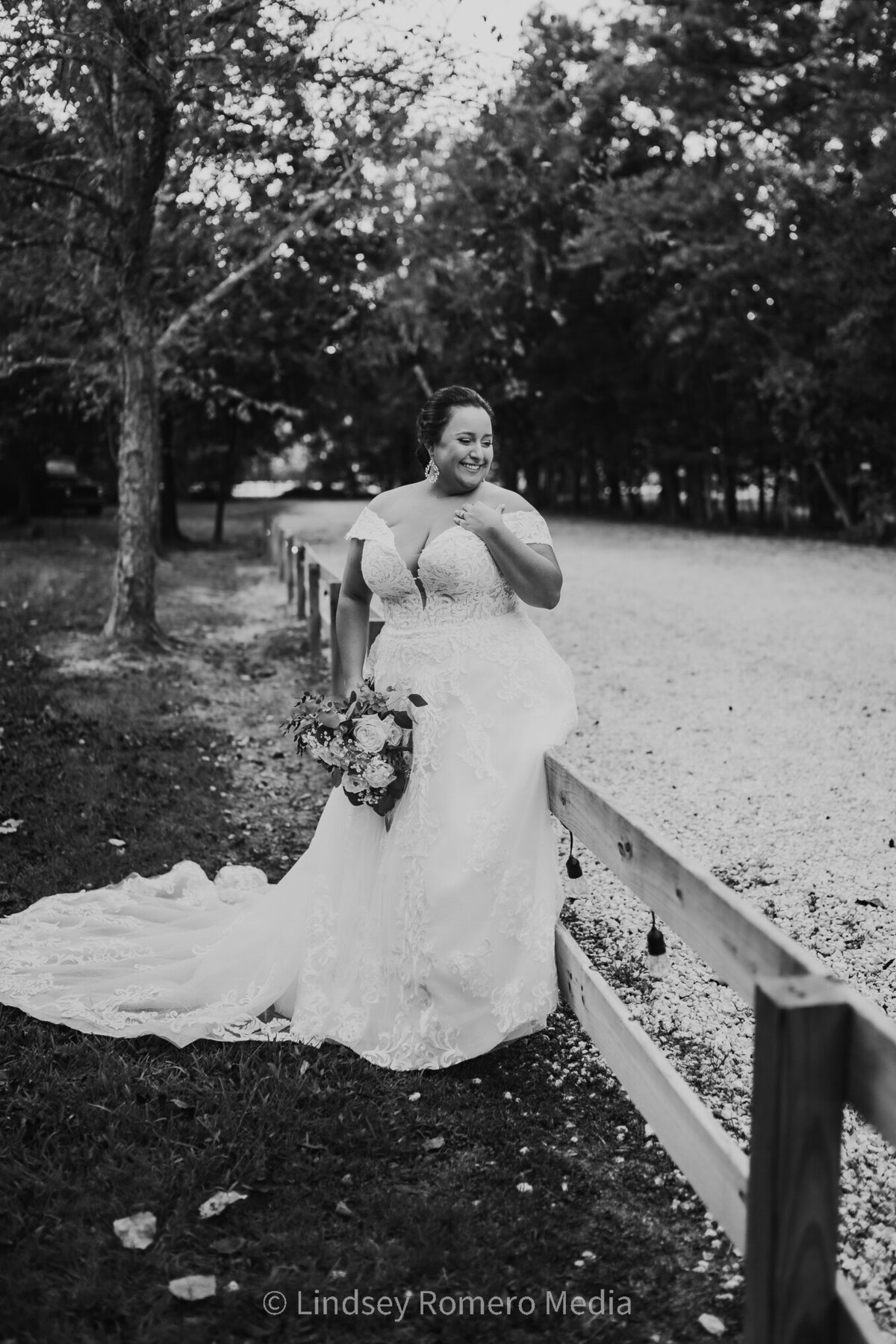 Black and White bridal photo on fence in Cypress Grove, Eunice, LA