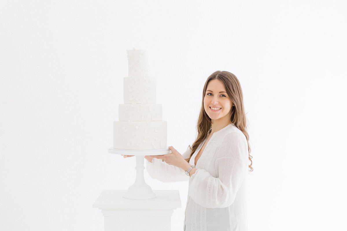 Elegant all-white wedding cake with sugar flowers