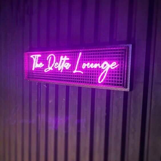 Caged Pink Neon Sign