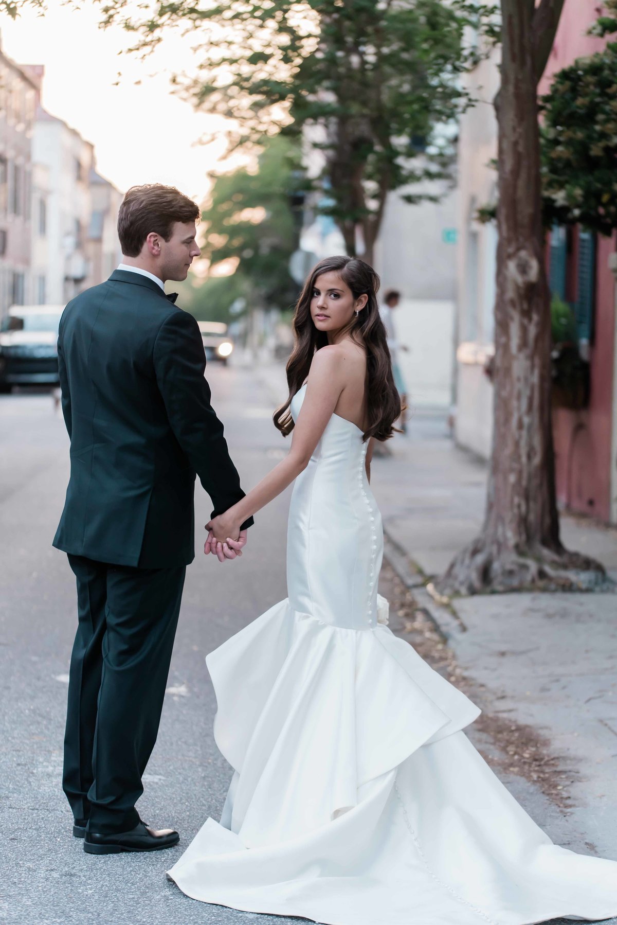 Bride and groom portraits around downtown Charleston, SC at sunset