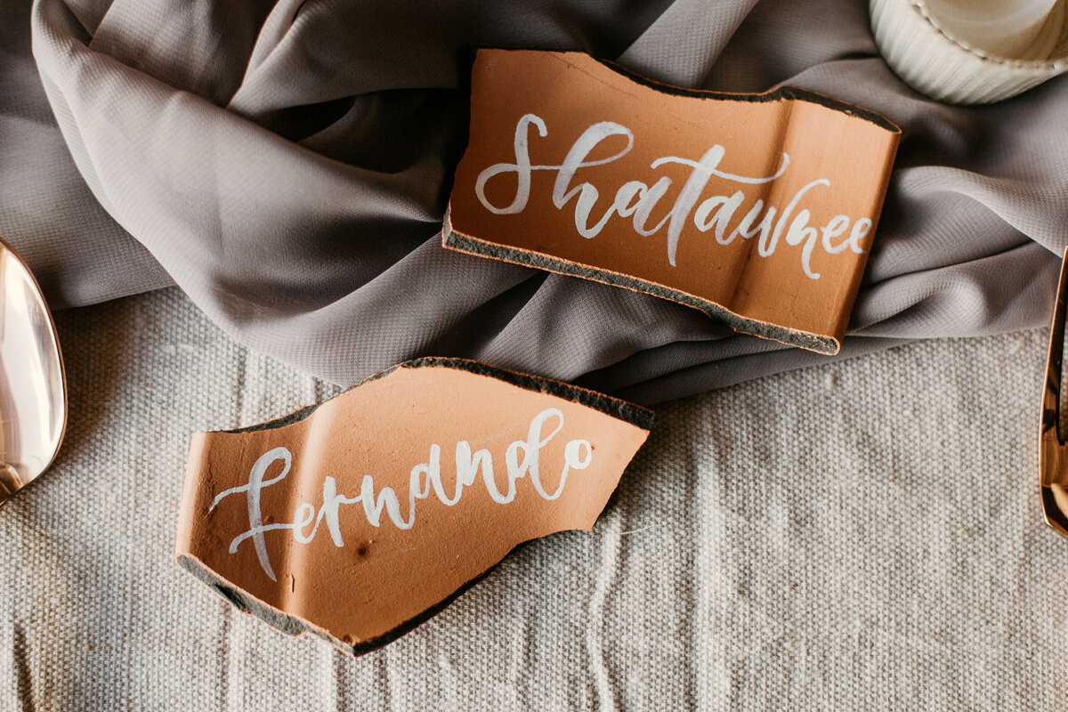 calligraphy on terracotta for bride and groom
