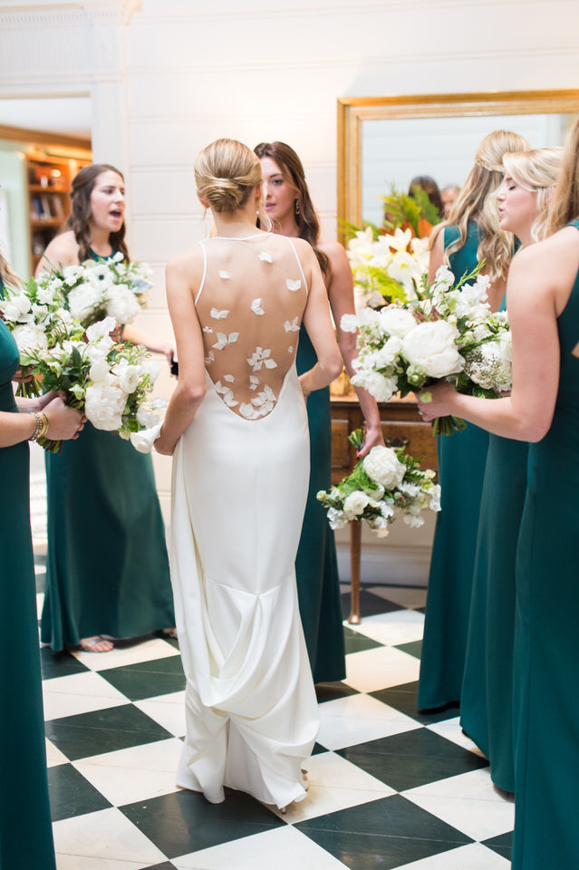bridesmaids wearing green dresses