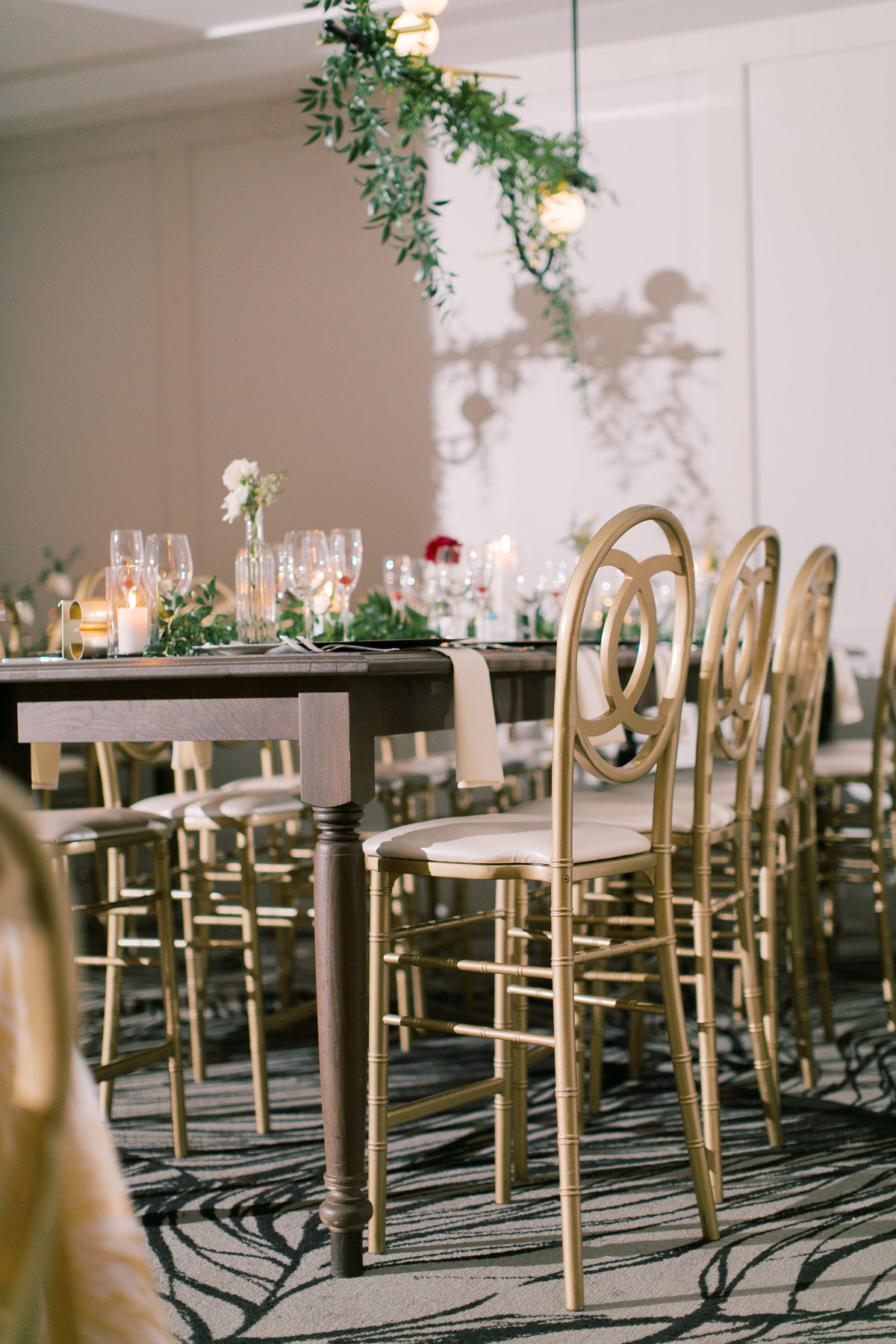 gold chair and wooden table for wedding reception in philadelphia wedding