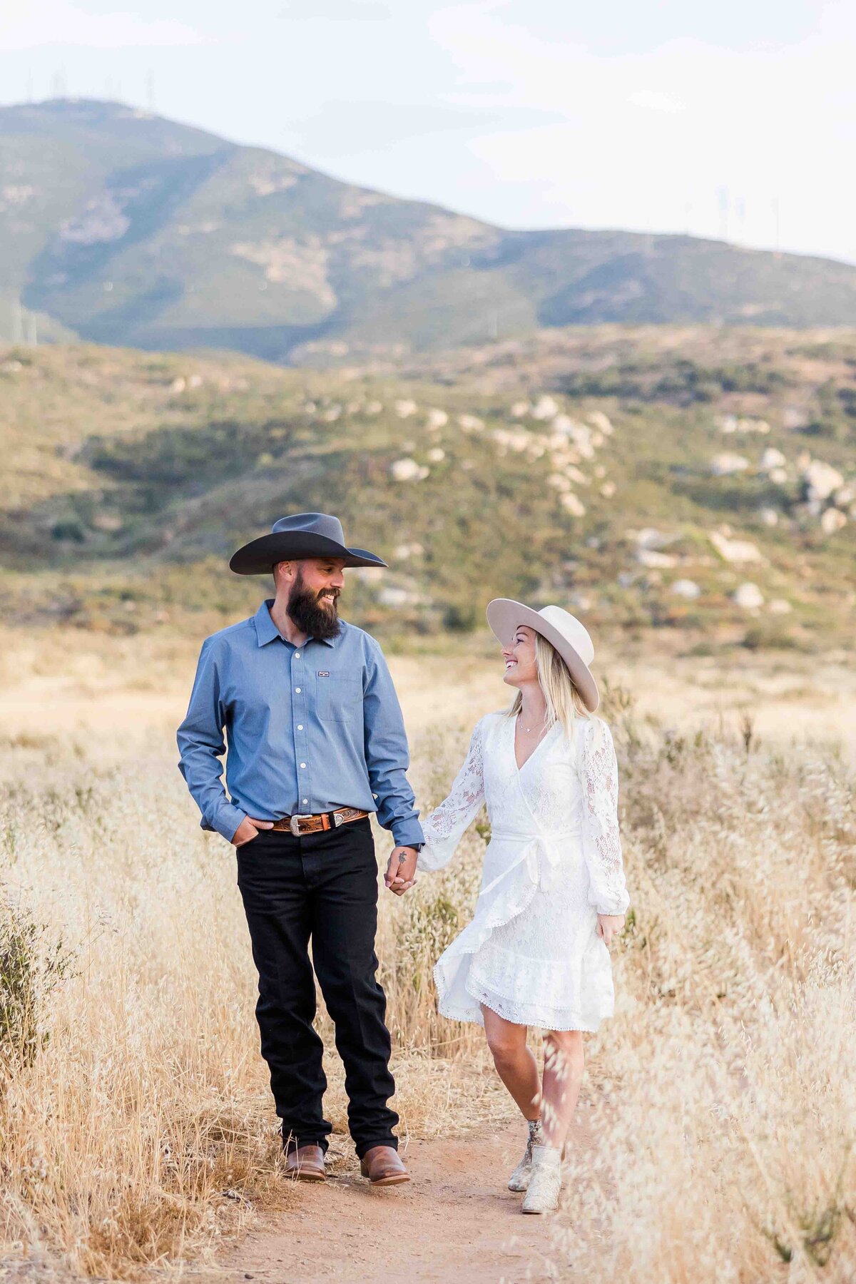 engagement-photography-san-diego-grassy-field-walking
