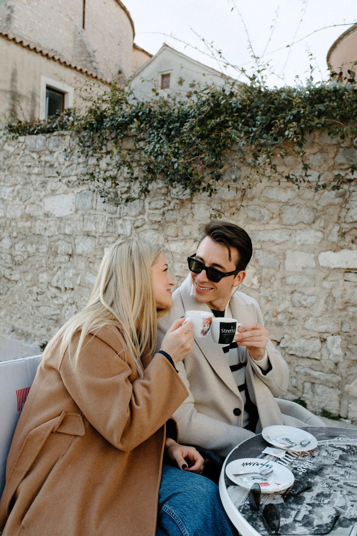 couple having coffee at coffee shop in zadar
