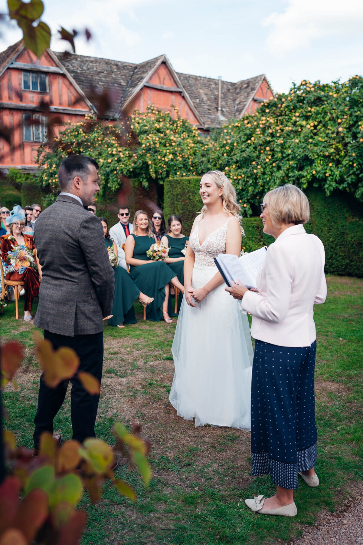 Pauntley-court-wedding-photographer-couple-during-outdoor-ceremony