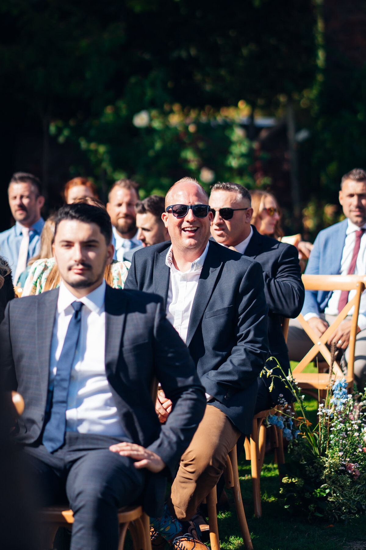 Pauntley-court-wedding-photographer-guests-during-outdoor-ceremony