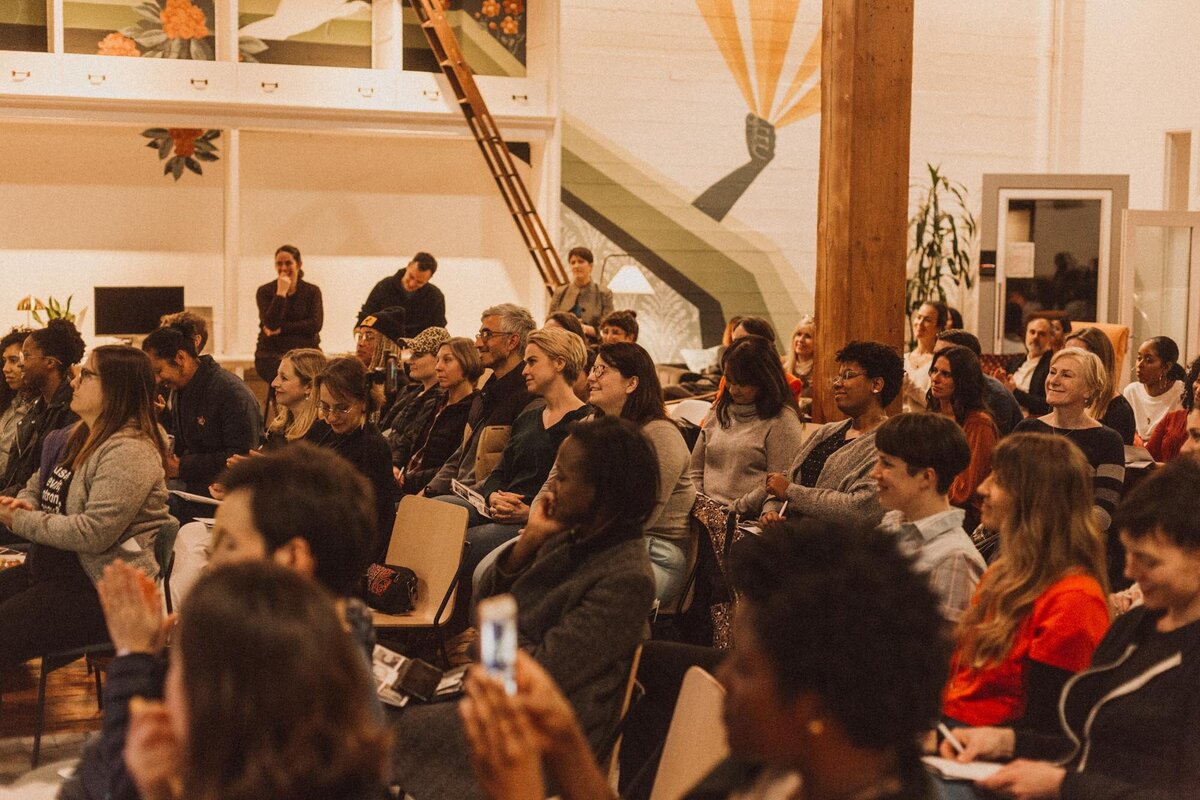 Candid photo of the audience attending a Black Her Stories event in Seattle, Washington