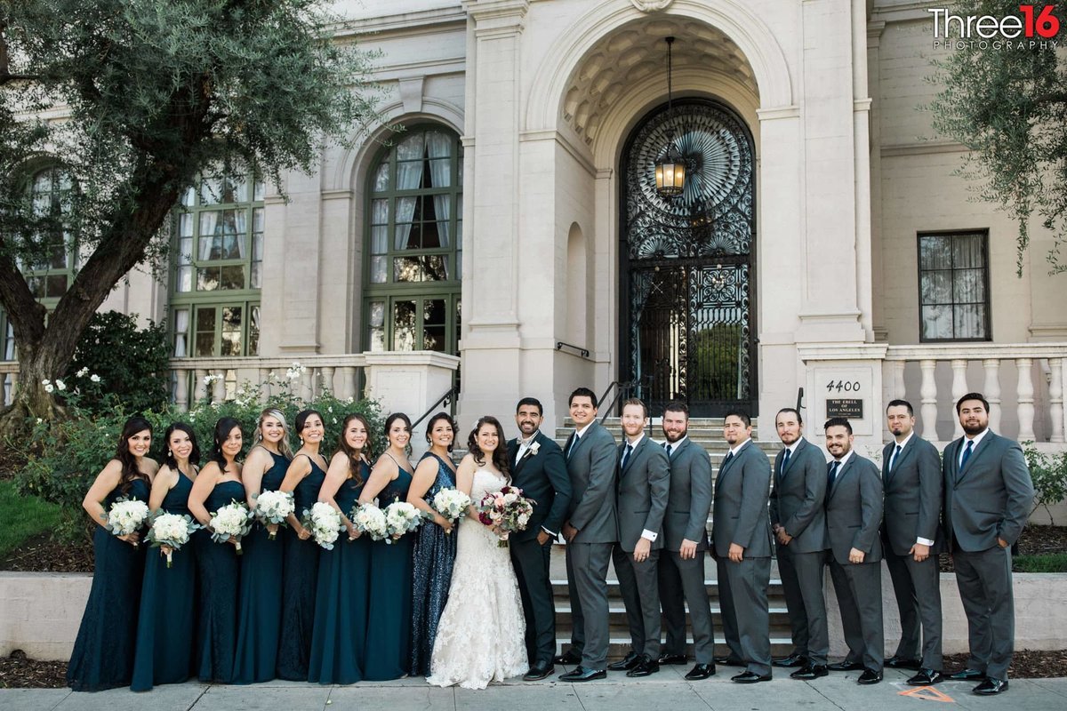 Bride and Groom pose with their 16 person bridal party