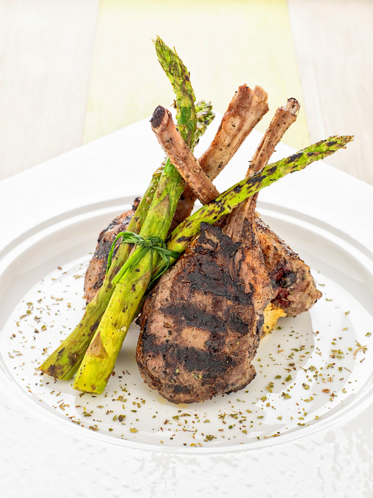 Lamb chops and asparagus stood up together